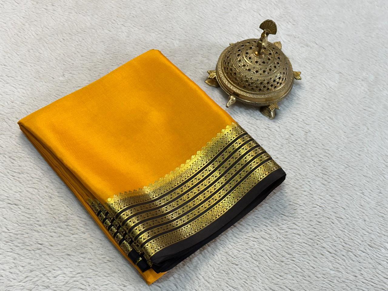 Classic Charm: Pure Gadwal Silk Saree with Elaborate Zari Borders