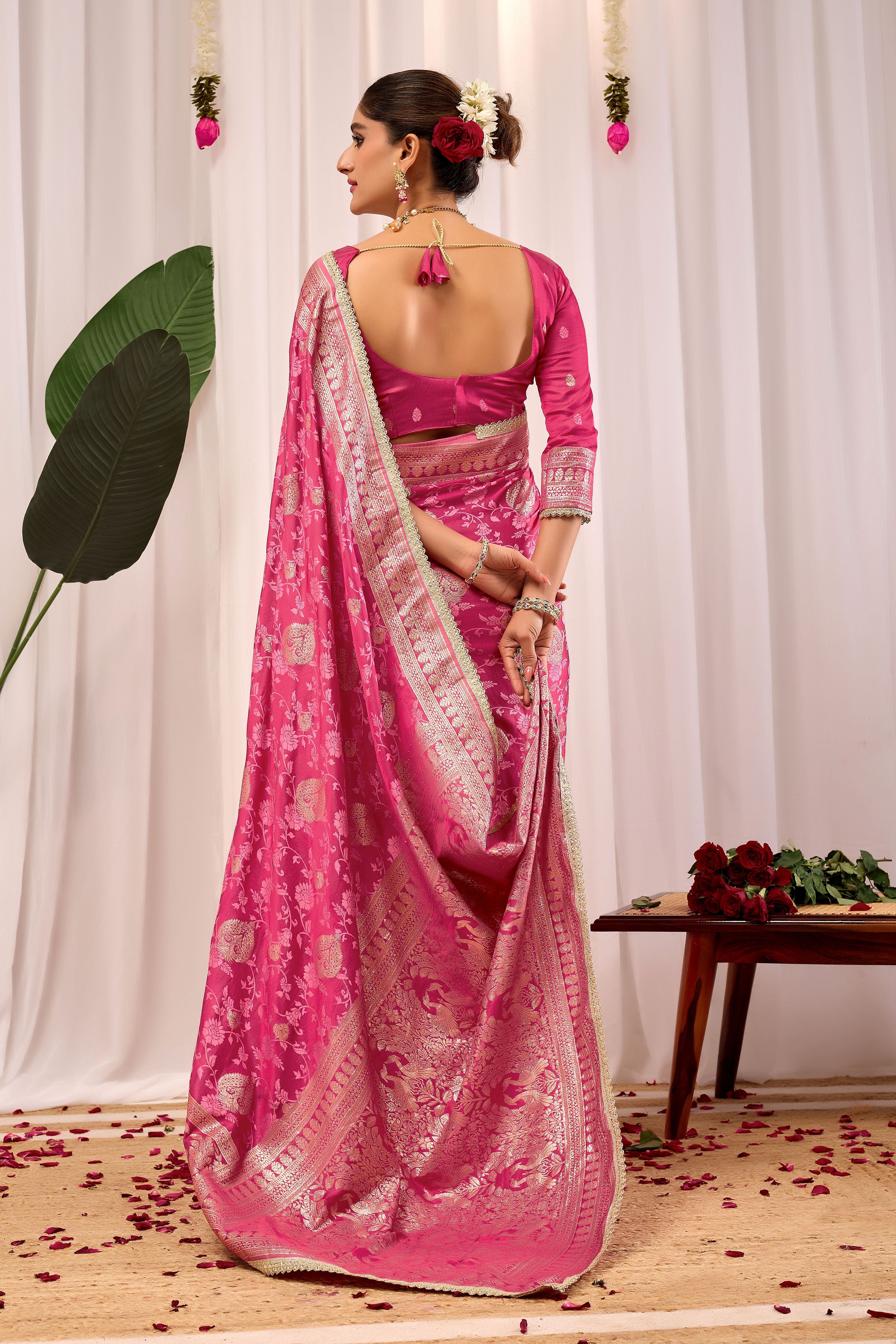 Elegant Rose Pink Floral Saree Featuring Traditional Motifs and Rich Zari Border for Festive Occasions