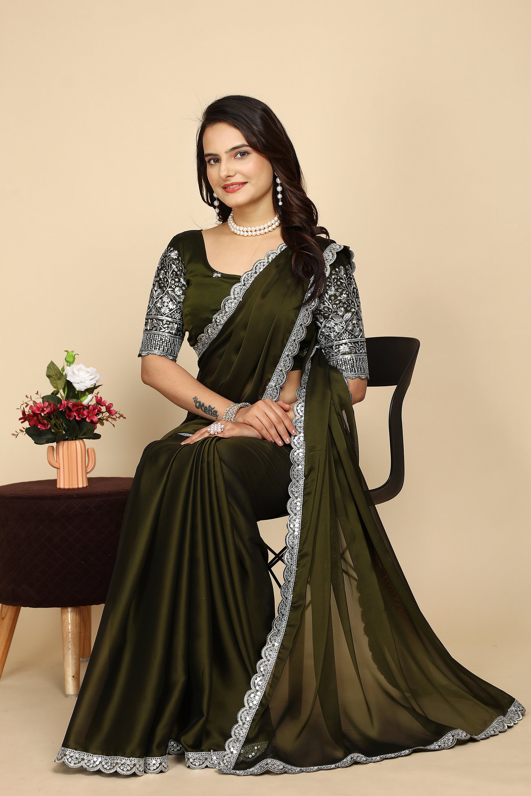 Silk Symphony: The Designer Saree That Defines Beauty in mehndi colour