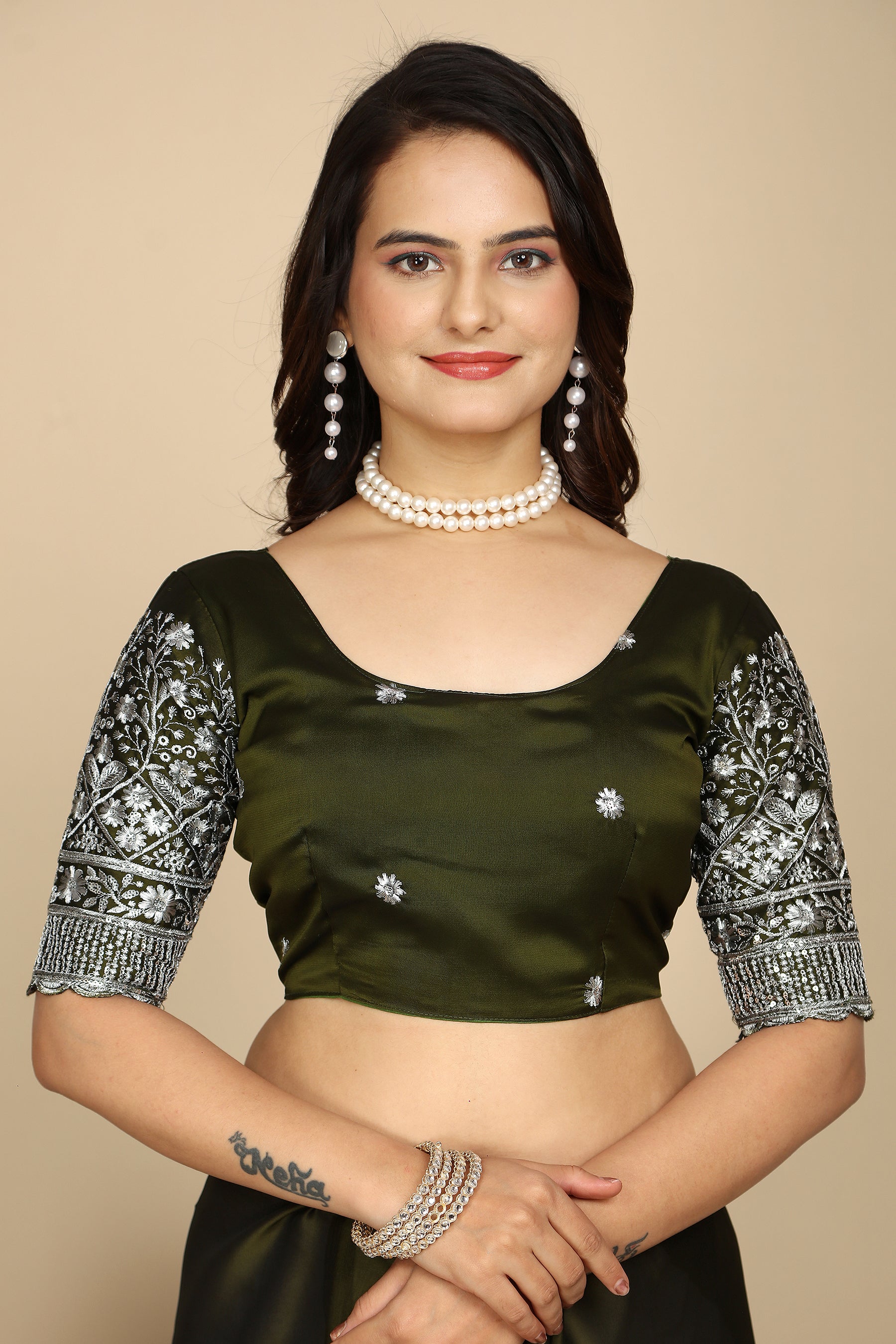 Silk Symphony: The Designer Saree That Defines Beauty in mehndi colour