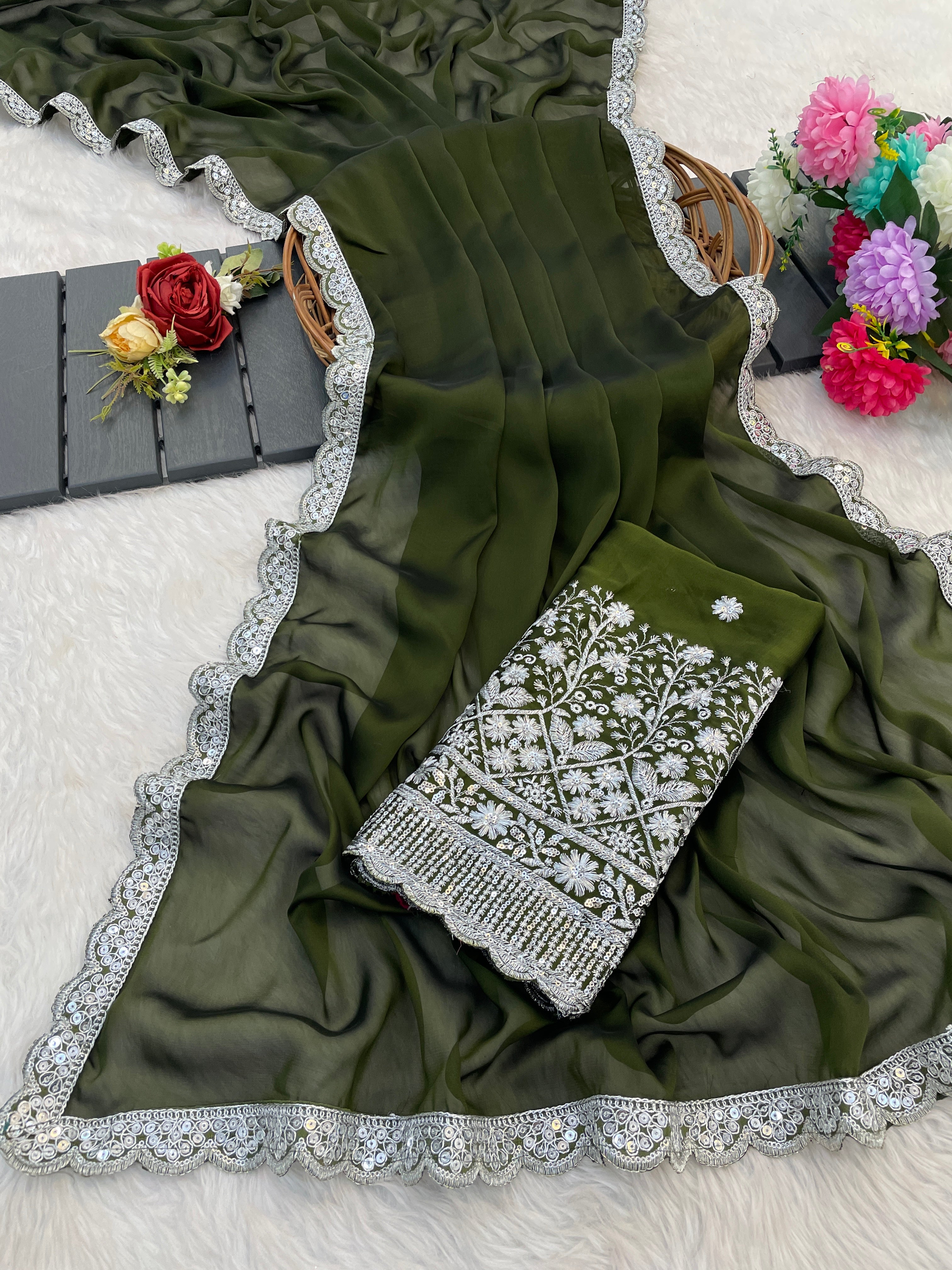 Silk Symphony: The Designer Saree That Defines Beauty in mehndi colour