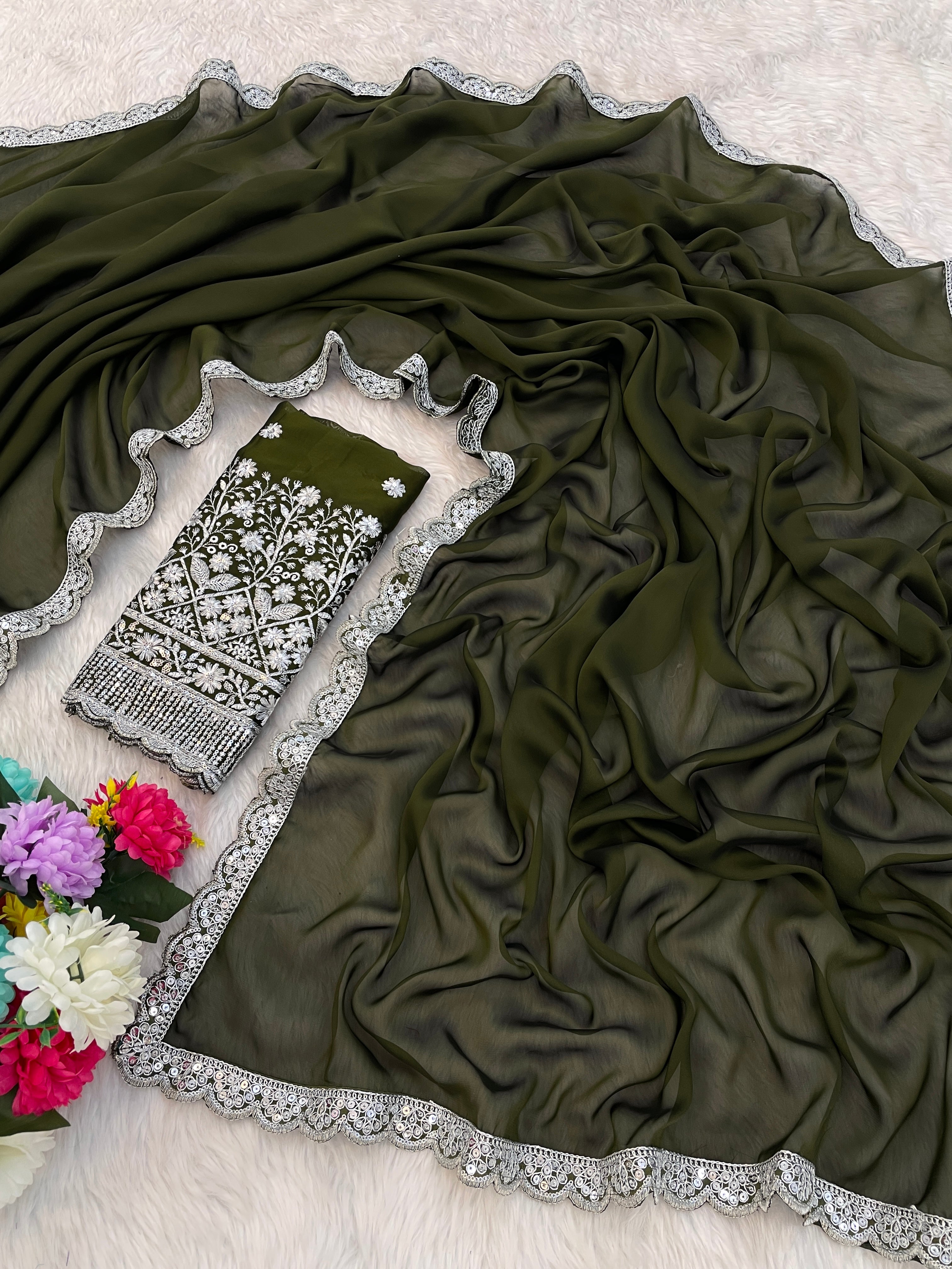 Silk Symphony: The Designer Saree That Defines Beauty in mehndi colour