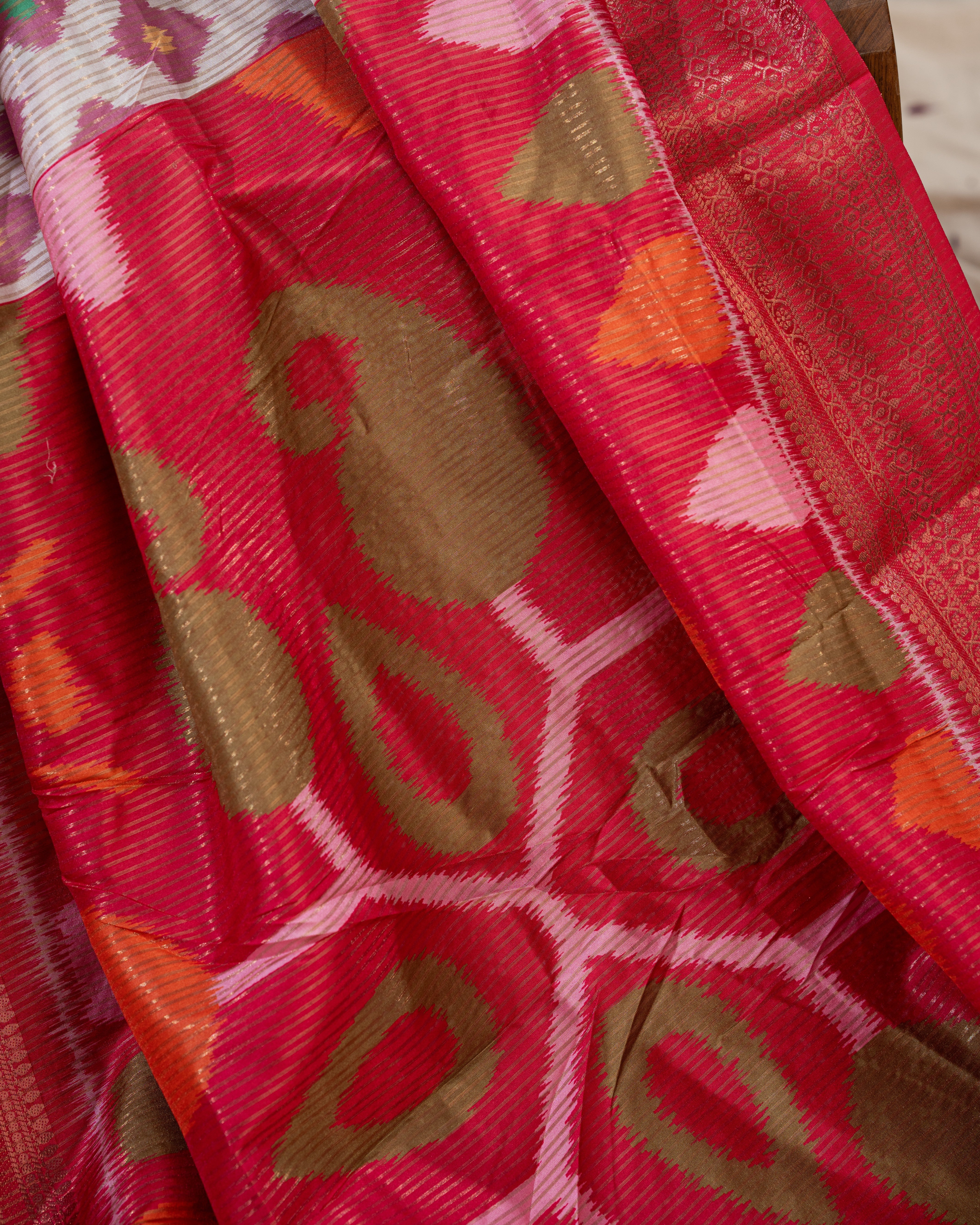 Premium semi crepe soft silk with ikkat print  with Rich Shine