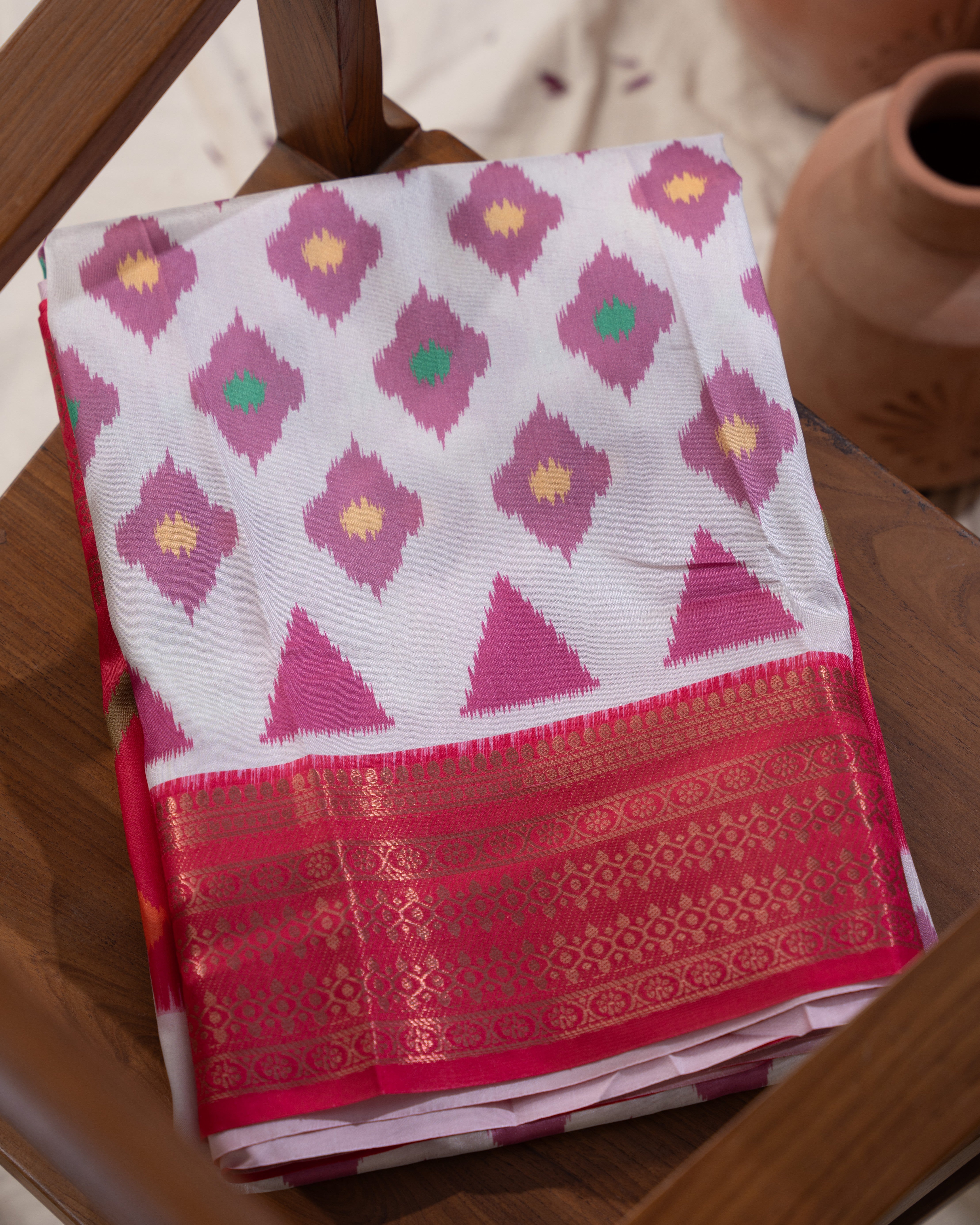 Premium semi crepe soft silk with ikkat print  with Rich Shine