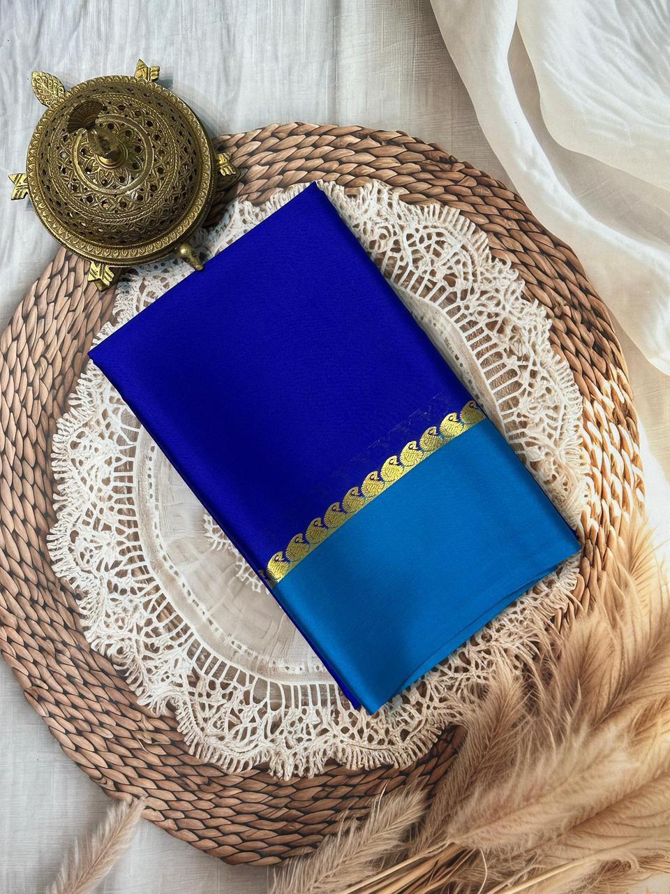 Ethnic Silk Weaving Saree Highlighted with Mango Motif Patterns and Zari Border