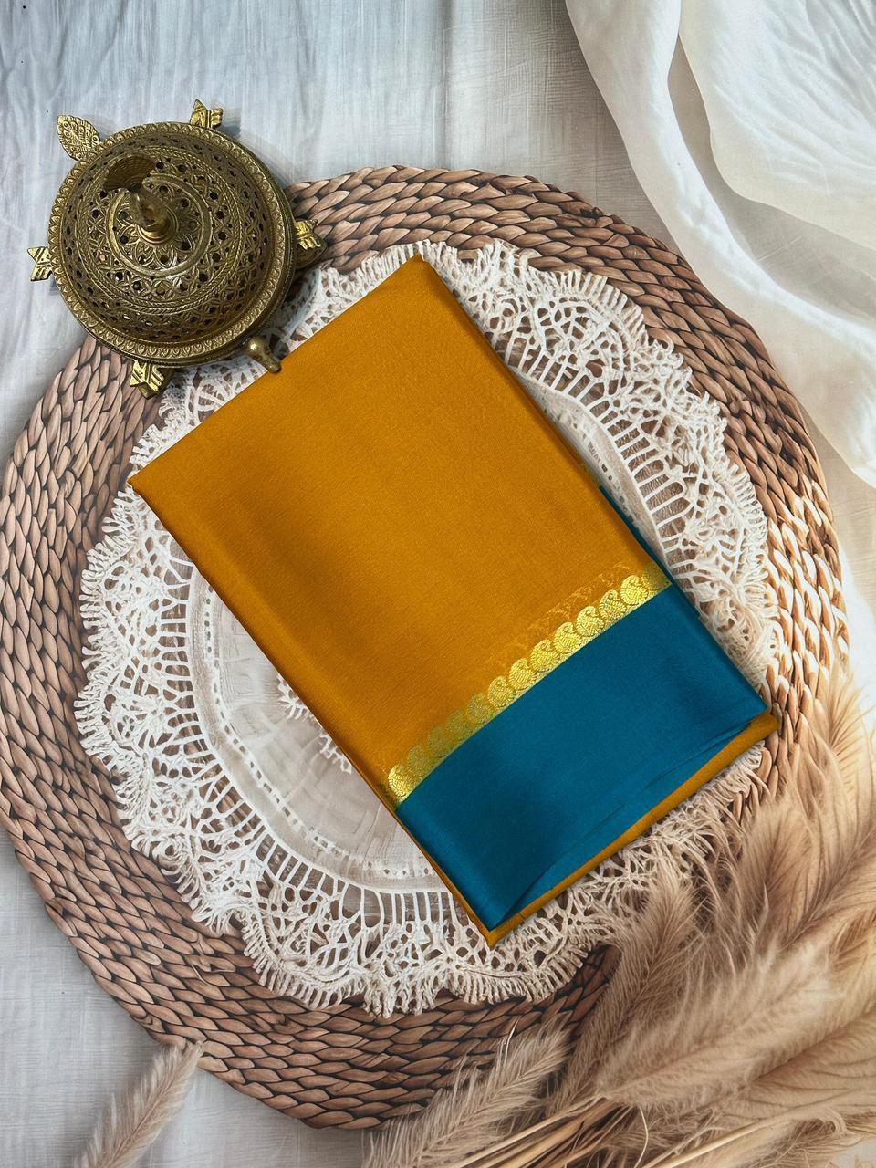 Ethnic Silk Weaving Saree Highlighted with Mango Motif Patterns and Zari Border