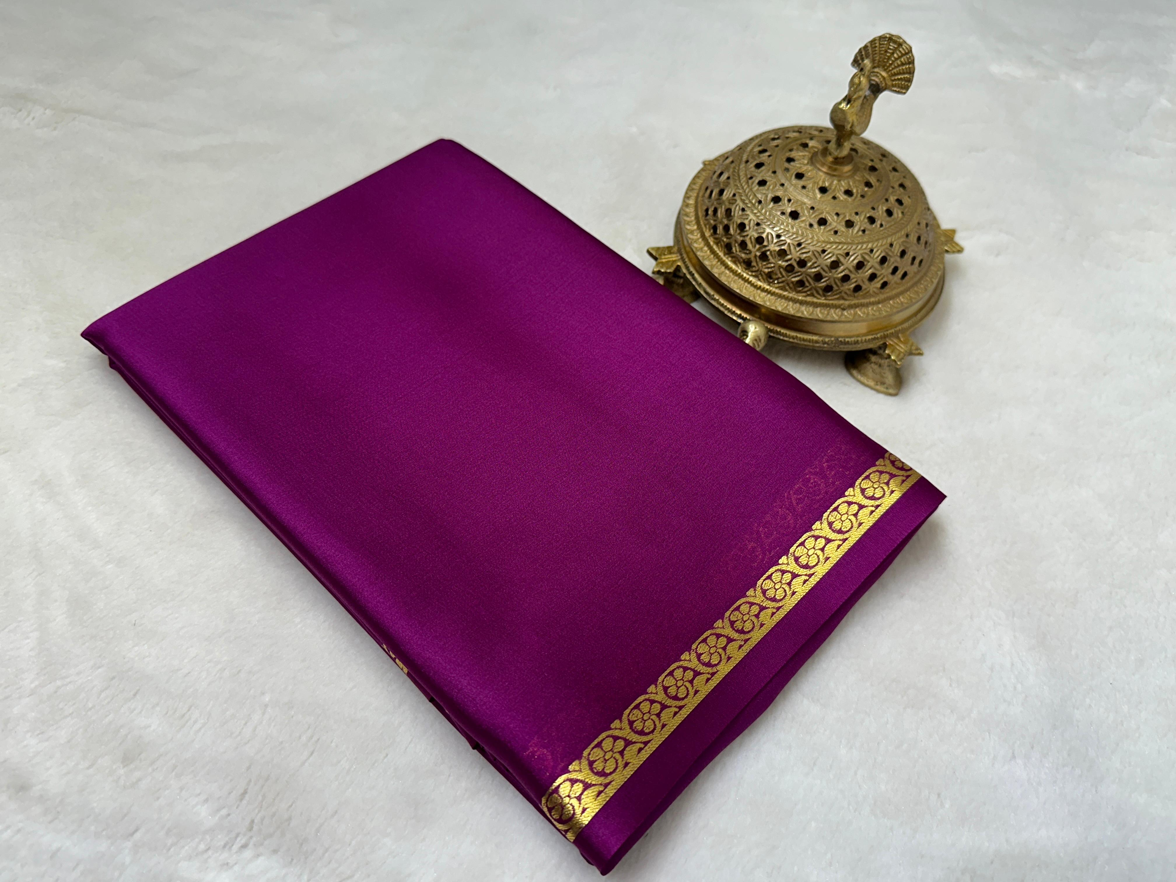 Elegant Solid Silk Blend Saree Featuring Rich Traditional Gold  Border