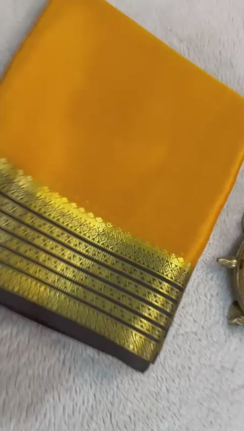 Load video: Classic Charm: Pure Gadwal Silk Saree with Elaborate Zari Borders